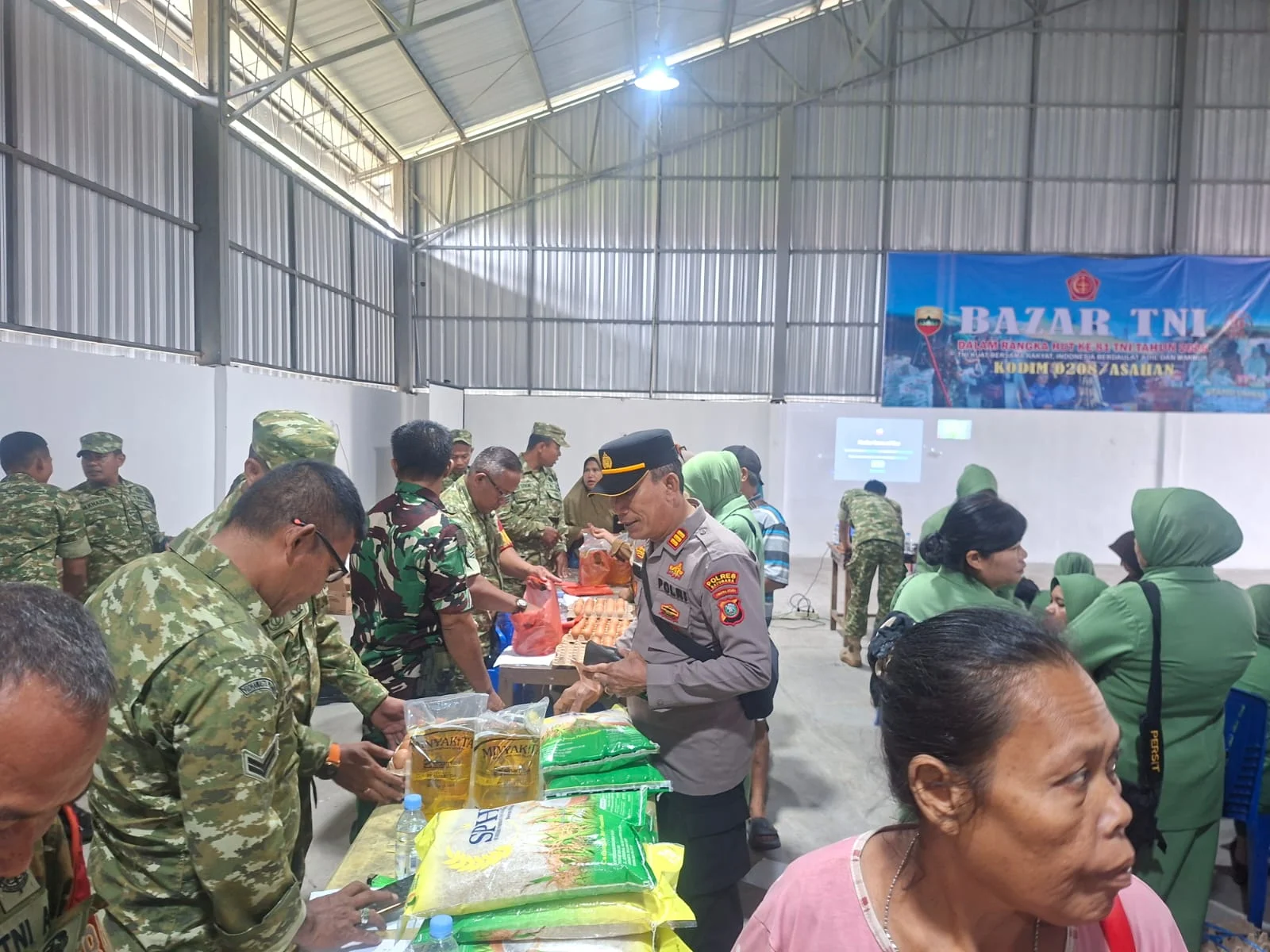 Polsek Talawi Hadiri Bazar Murah Kodim 0208/Asahan Sambut HUT TNI ke-81