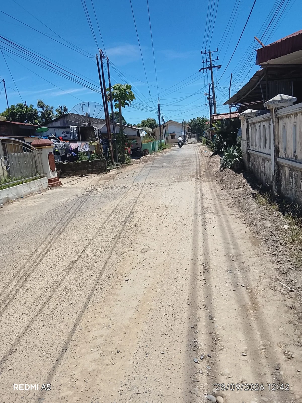 Perbaikan Badan Jalan Aspal Padang Matinggi Kampung Jawa Dipercayakan Kepada CV Barisan Pejuang. 